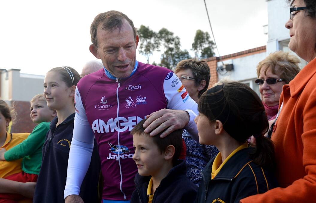Federal Opposition Leader Tony Abbott attends a community meeting in Hamilton yesterday. 