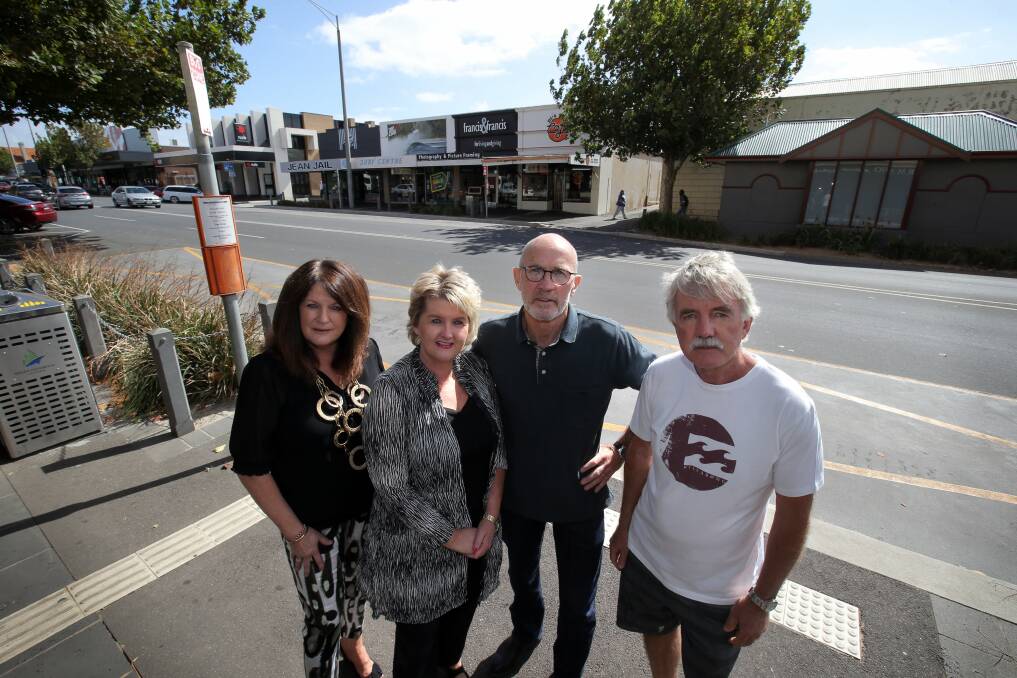 Shop owners Maria Chambers (left), Annie Freitag, Gary Francis and Trevor Spehr, owner of Warrnambool Surf Centre, want the bus stops in Koroit Street relocated. 