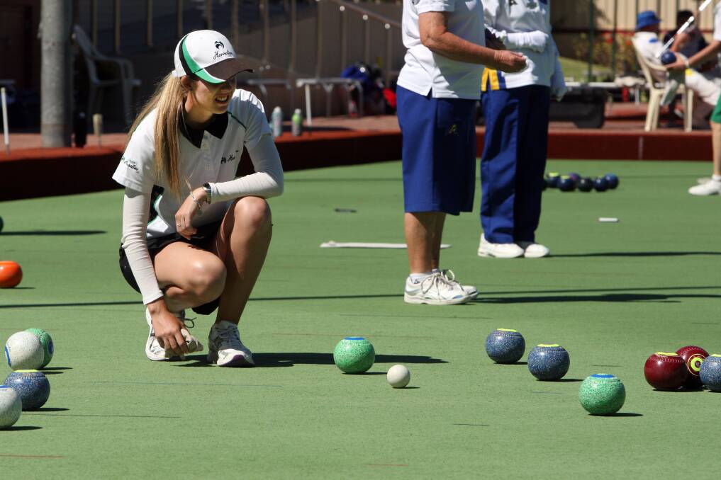Chloe Stewart, from Kyneton, is a picture of concentration during Warrnambool’s ladies’ pairs title. 