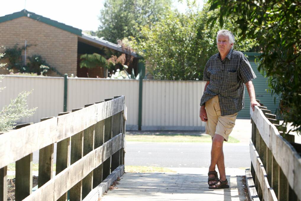 Moonah Street property owner Peter Marriott says planned $2.85 million flood prevention works along Russells Creek will still leave many low-lying properties unprotected.