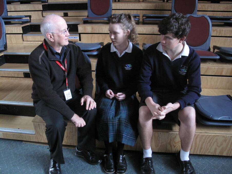 Road safety campaigner John Maher talks to Warrnambool College year 11 students Emma Dodwell and Hamish Ander, both 17, about the death of his daughter Carmen in a road accident 16 years ago.