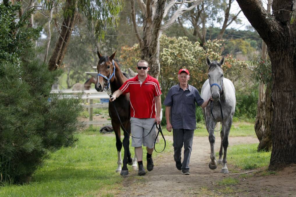 Mailors Flat trainers (from left) Aaron and Allan Peterson with their Flemington Oaks Day runners Kuakata (left) and Run Diego. 