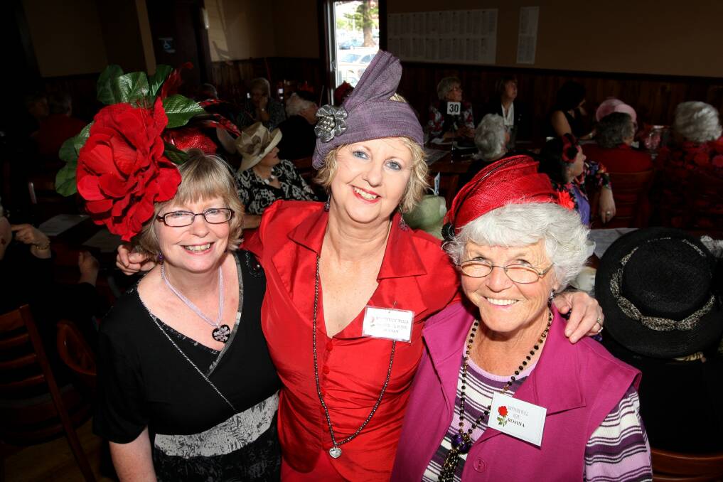 Elaine Oppenhiem (left), Suesan Gliddon, and Rosena Guiney soak up the Cup atmosphere at The Royal Hotel in Warrnambool. 