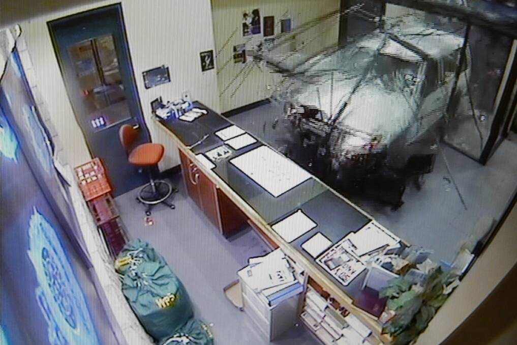 The moment a car slammed through the front doors of the Warrnambool Police Station taken from the station's CCTV system. 