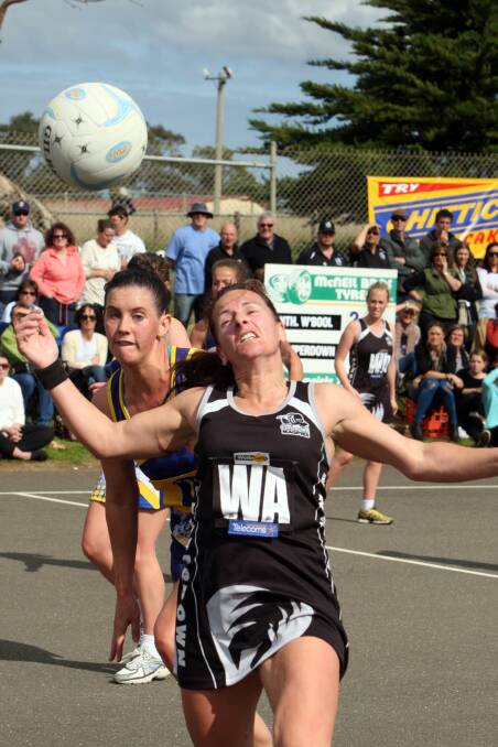 Camperdown's Tracey Baker and North Warrnambool Eagles' Sophie Barr. Pictures: DAVE LANGLEY