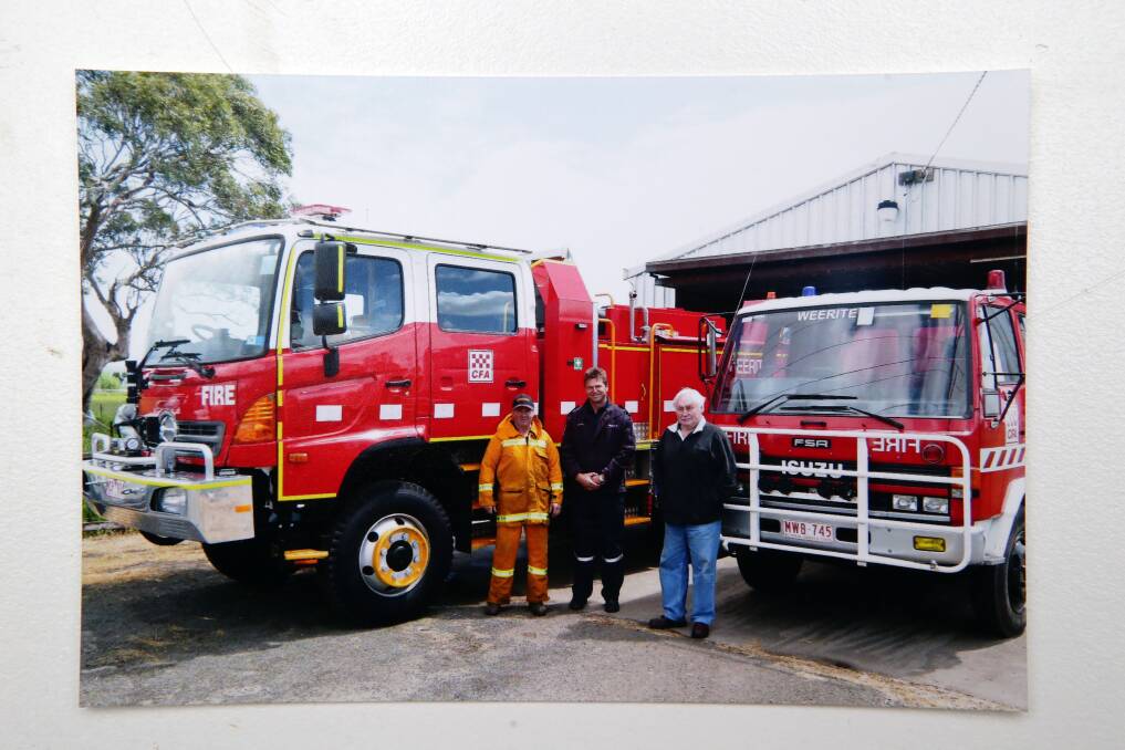 CFA members Mike Crutchfield (left), Phil Whytcross and Ron Jones welcome Weerite’s new $400,000 tanker. 