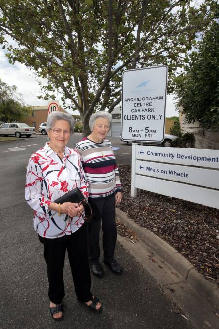 Yola Bennoun (left) and Joan Hunter, both from Warrnambool, are annoyed at the lack of long-term parking spaces available near the Archie Graham centre.  