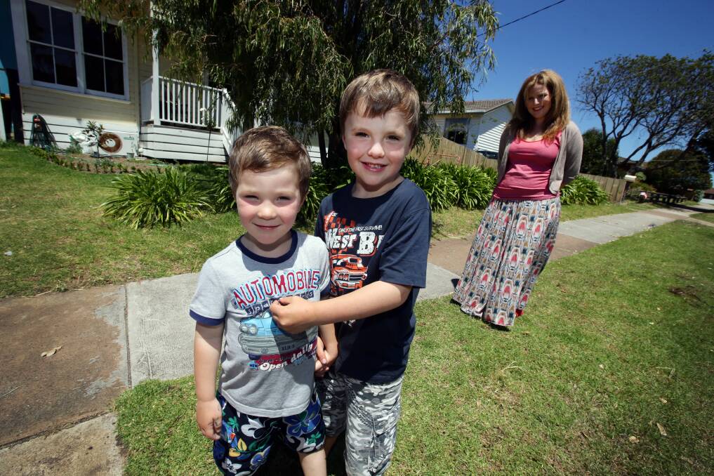 Proud, but angry,  mother Kelly Blythe with her sons William, 4, and Patrick, 6, outside their Port Fairy home. 
