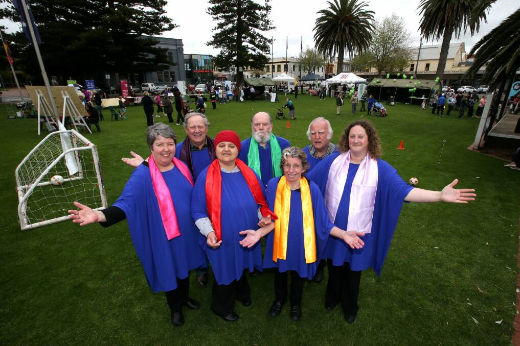 STAR-beat Choir members Janet Punch (left), Graeme Millgate, Vanessa Nell, John Furniss, Jenny McLaren, Greg Fitzgerald and Eila Lyon performed at yesterday’s Get Amongst It Day, held at the Civic Green as part of Mental Health Week. 