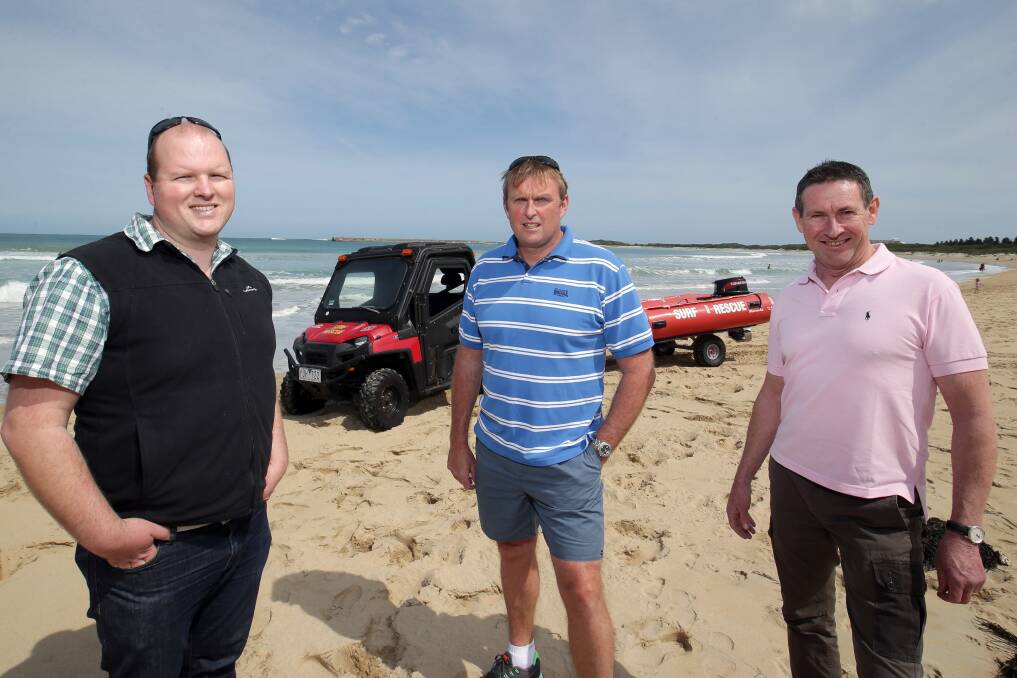 Warrnambool Surf Life Saving Club captain Robert Dart (left), president Michael Owen and treasurer Kevin Ryan with the organisation’s existing rescue buggy. State funding will help add a four-wheel-drive rescue vehicle to its stable.