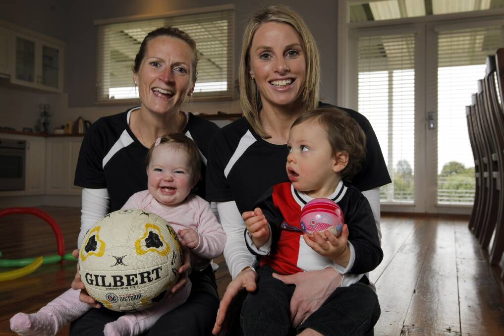 Kate Dobson (left), with daughter Ellie, and Kate Foster, with son William, will co-coach Koroit this season.