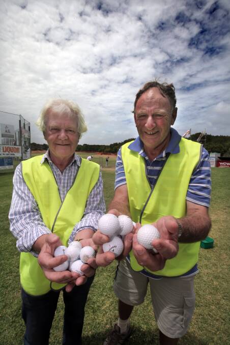 Warrnambool East Rotary Club members Russell Isaac (left) and Ralph Ludeman are having a ball at the annual foreshore hole-in-one competition.