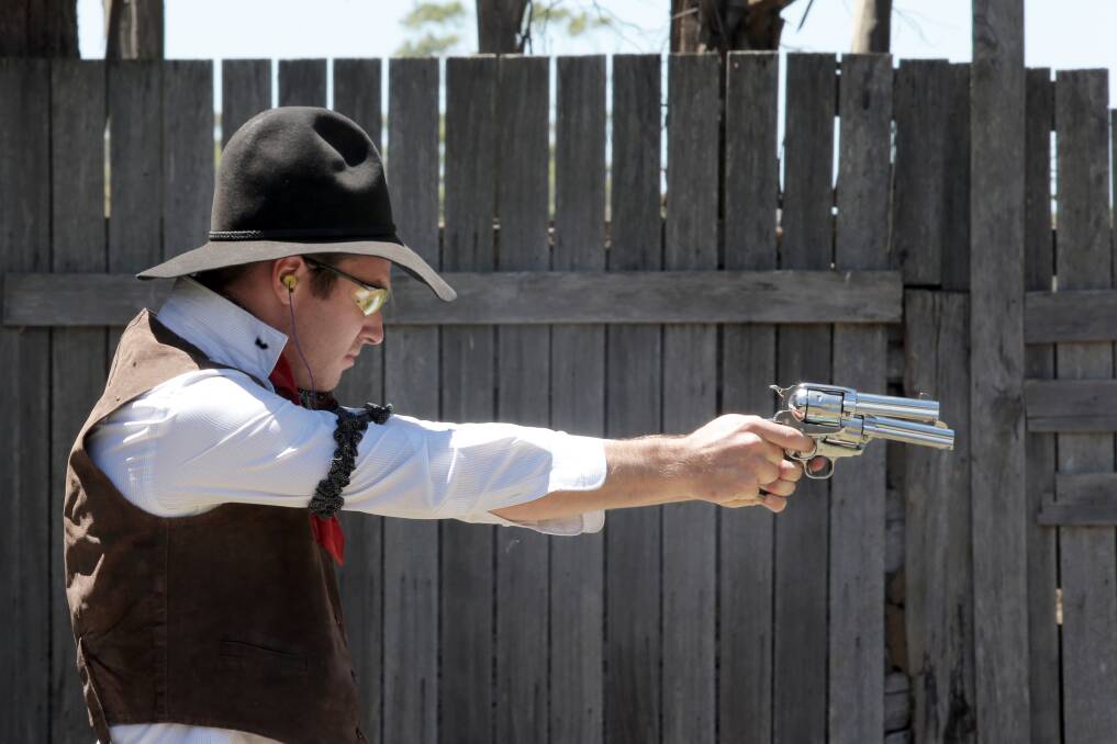 Kyle “Mad Dog” Pearse, of Bendigo, tests his skills on the Woolsthorpe range with Colt Peacemaker replica revolvers. 