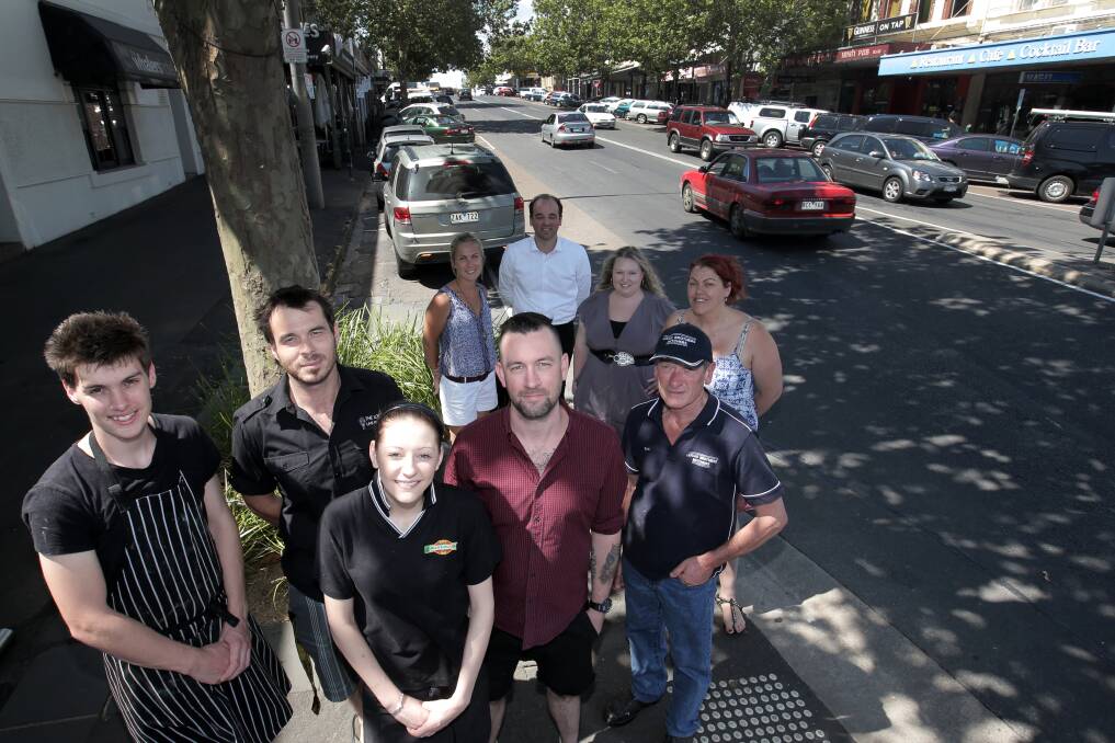 Liebig Street traders Michael Stewart (front left), Jarrod Hawker, Kasey Jarvis, Josh O’Dowd and Sam Harris are happy to see the Wunta Fiesta return to the civic green precinct, with support from fiesta committee members Katie Olsen (back left), Jarod Gwynne, Donna Gladman and Catherine Williams. 