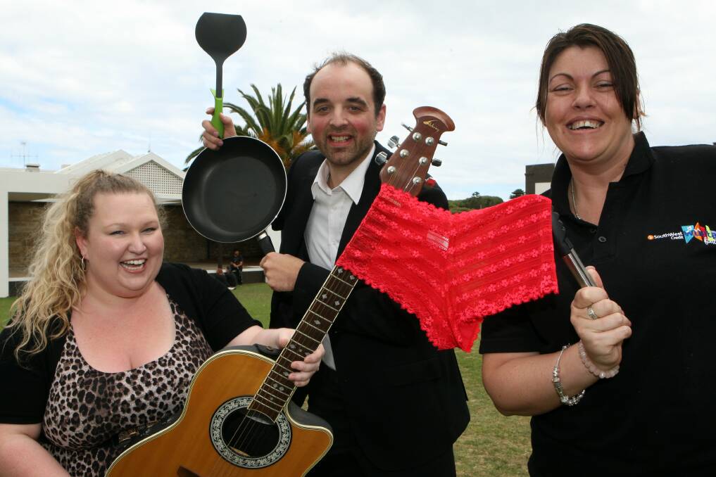 Wunta Fiesta committee members Donna Gladman (left), Jarrod Gwynne and Catherine Williams get in the mood for tomorrow morning’s Wunta Breakfast and Undy 500 at the Civic Green.