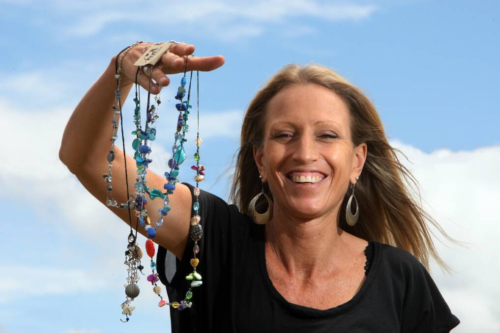 Anji Barker with some of the handmade jewellery crafted by impoverished women and girls in Bangkok.
