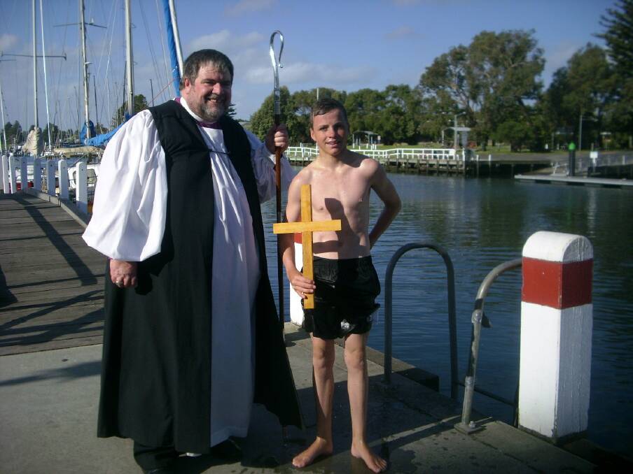 Ballarat Anglican Bishop Garry Weatherill with Blair Hetherington, who retrieved the cross from the waters of the Moyne River.