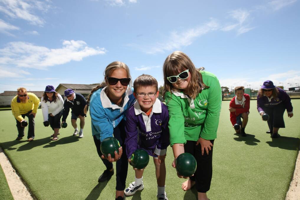 Clothing will be casual and ability optional when the Warrnambool Lawn Tennis Bowling Club hosts a fund-raising come-and-try day at its Pertobe Road greens on Sunday. Bowling up for Relay for Life will be Shona O’Brien, 13 (front, left), Kuyan Bowden, 7, and Brianna Bowden, 10.