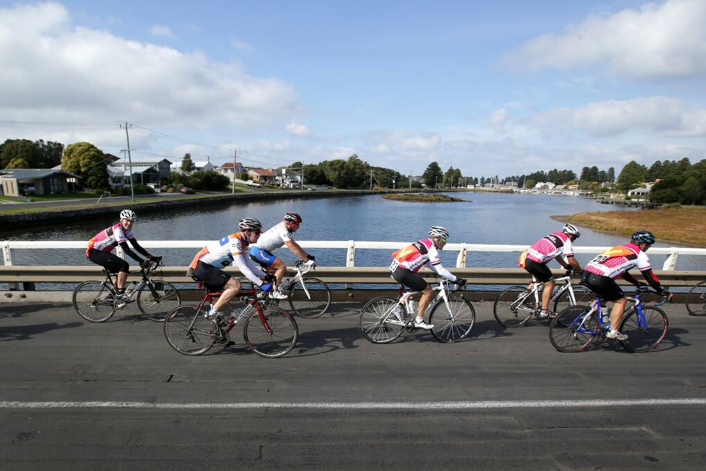 Cyclists ride across the Moyne River bridge on the last leg of the Murray to Moyne journey into Port Fairy