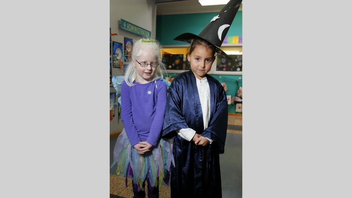 Merrivale students dressed up at their science day event, from left, fairy Akira Fish-Laird, 6, and wizard Talia Cooper, 7. Picture: ROB GUNSTONE