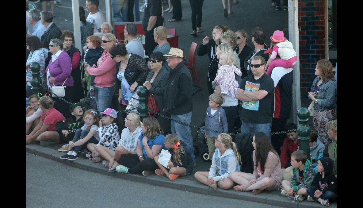 Crowds line the streets for the Port Fairy parade. 131231AS43 Picture: AARON SAWALL
