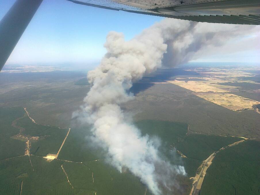 An aerial view of the Kentbruck fire soon after it started yesterday. Photo courtesy Department of Sustainability and Environment