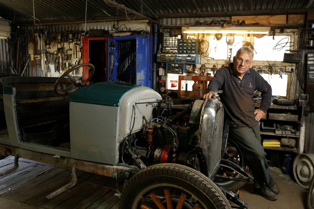 Roy Begelhole, of Dennington, with his 1927 Whippet Tourer, which he is restoring for the Lake Pertobe display. 121227RG35 Picture: ROB GUNSTONE 