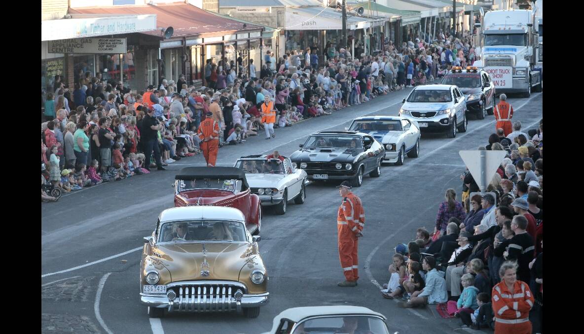 Cars join in the Moyneyana Parade in Port Fairy. 131231AS33 Picture: AARON SAWALL