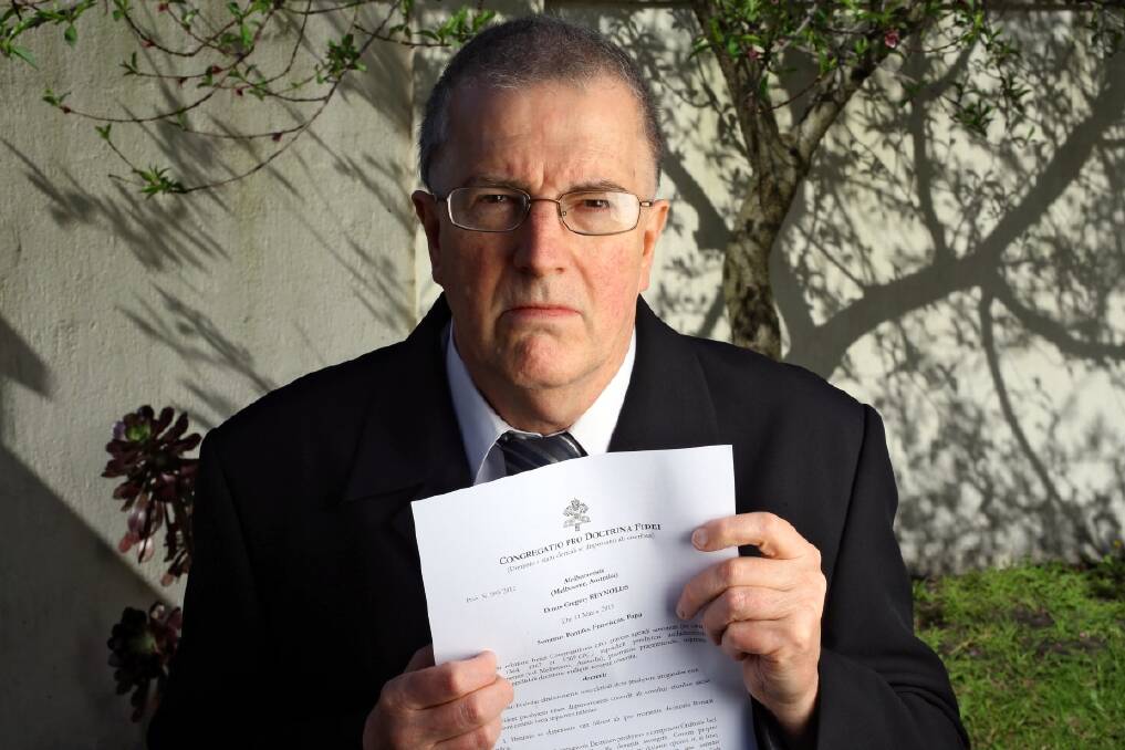 Ex priest Greg Reynolds with a letter from the Vatican which has ex communicated him. The Age. Photo: Angela Wylie. 