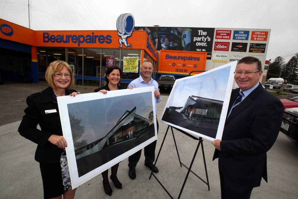 Barwon South West district property services manager Lyneve Whiting, regional director Helen Vaughan, Warrnambool DEPI principal scientist Joe Jacobs and Premier Denis Napthine holding new DEPI building plans at the Beaurepaires site on Raglan Parade.  Picture: DAMIAN WHITE