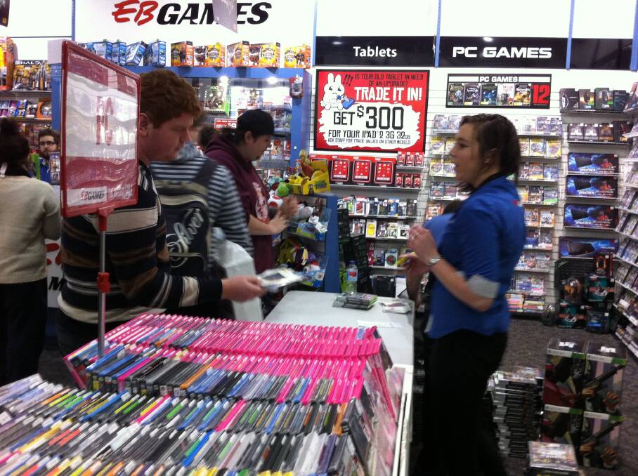 Hundreds of gamers lined up to collect pre-ordered copies of Grand Theft Auto V at EB Games Warrnambool's midnight launch.