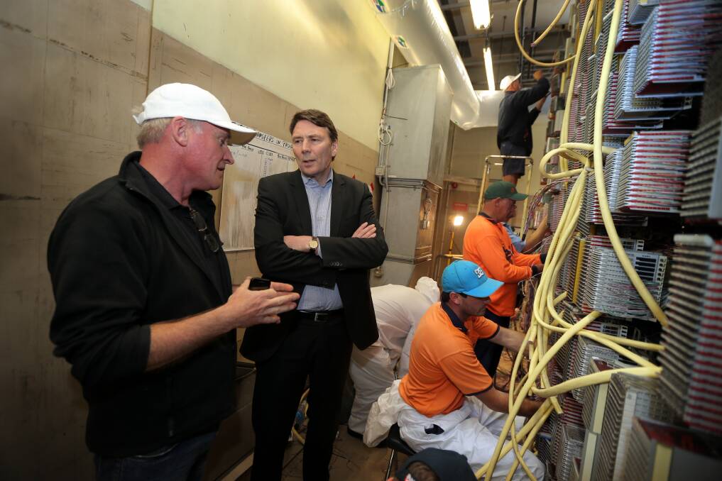 Telstra CEO David Thodey inspecting the Warrnambool exchange building and speaking to workers. 