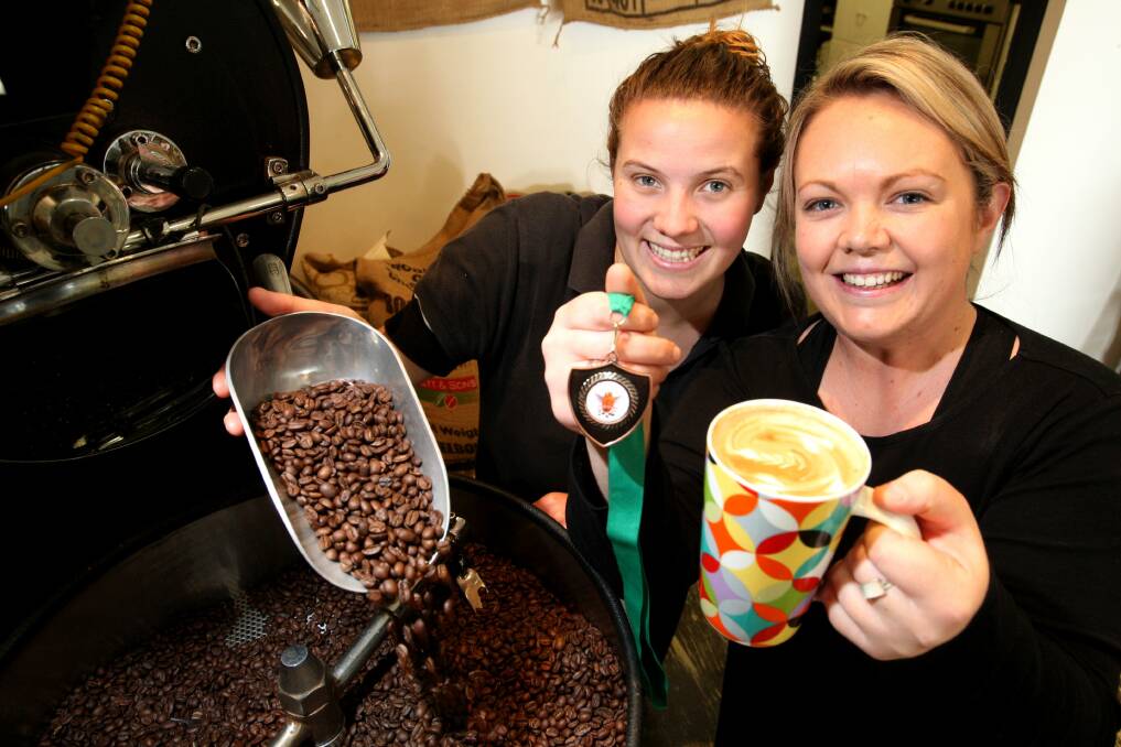 Katrina Graham and Beth Auld celebrate Piccolo Cafe's success for its decaf blend, which won a National Bronze Medal from the Nativa Golden Coffee Roasters Awards. Picture:LEANNE PICKETT