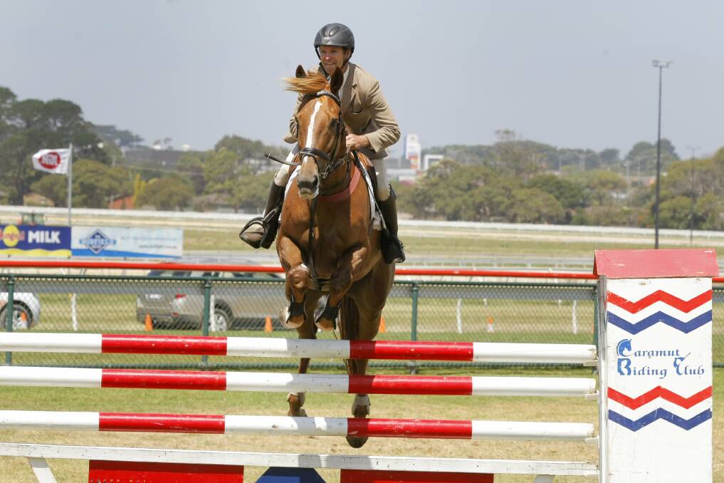 Russell Johnstone, aboard Carlo, on his way to a jump off for first place.