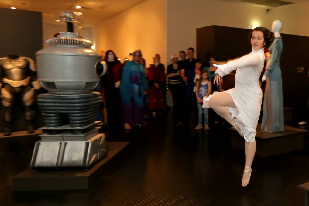 Iolande Diamantis, 15 of Warrnambool, dances as Princess Leia, at the Invasion opening.