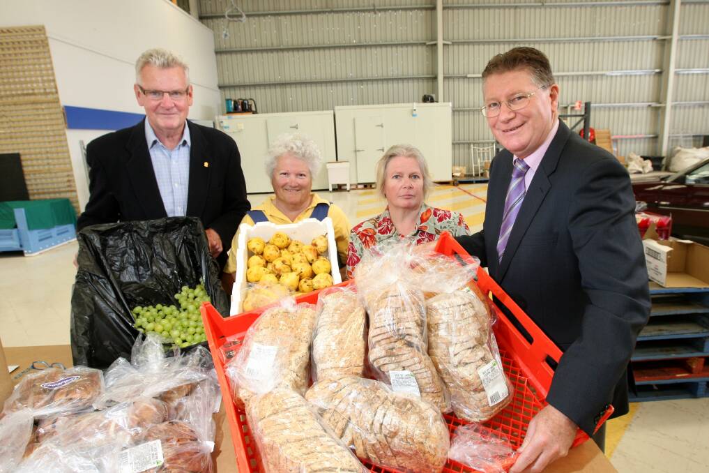 Food Share's Brian Beirne, Elizabeth Field and Cathy Harberson with Member for South West Coast Denis Napthine at the group's new home.