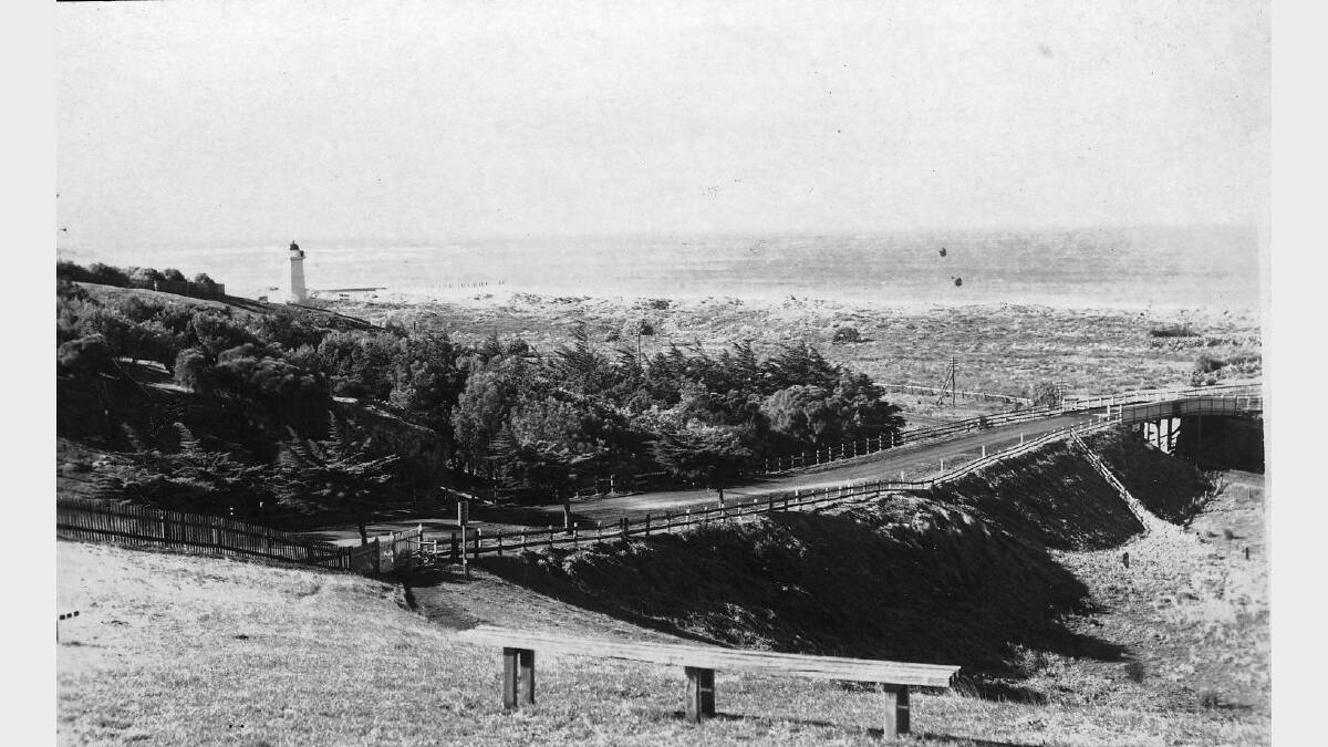 View of Lady Bay from Cannon Hill in about 1910. The Japan Street tunnel (built in 1856) appears to be visible in the distance as an outlet at the Flume, not yet covered completely by sand. SOURCE: Warrnambool & District Historical Society.