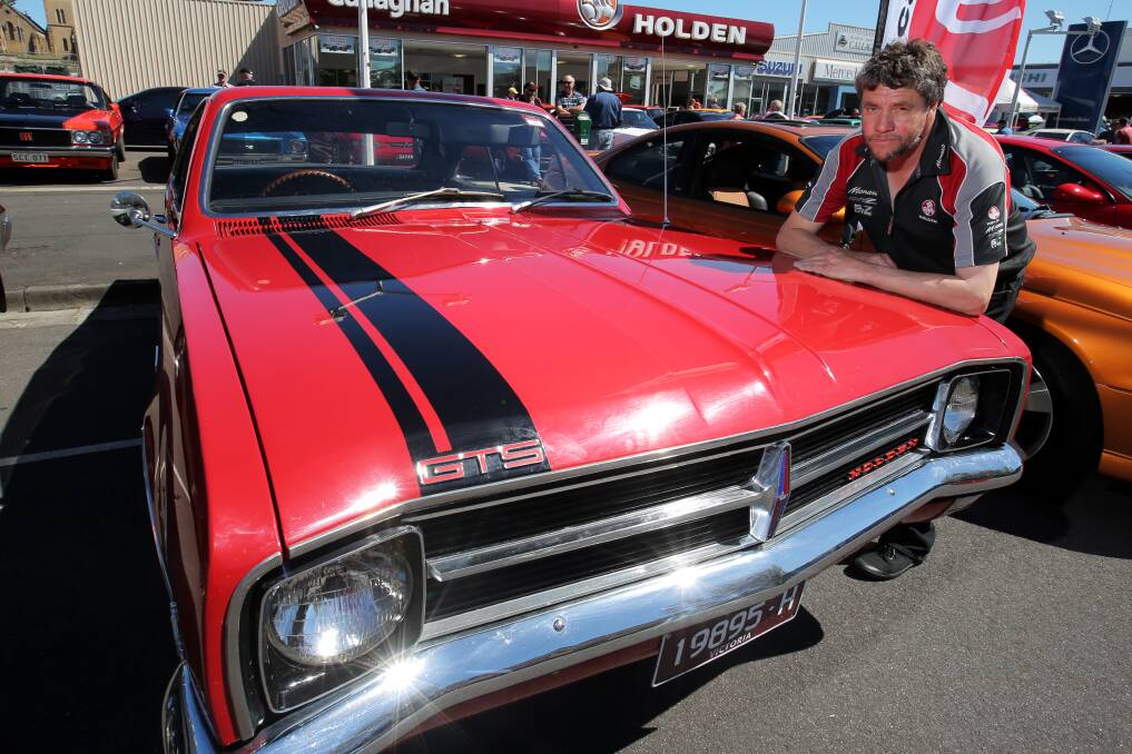 Brett Pownceby, from Colac, relaxes against his 1968 Monaro GTS. Picture: ROB GUNSTONE