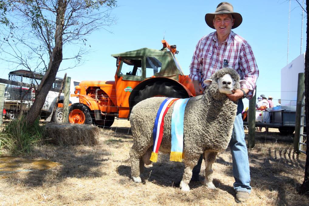 Mike Deppeler from Condah with his supreme Champion ram of show Corriedale.