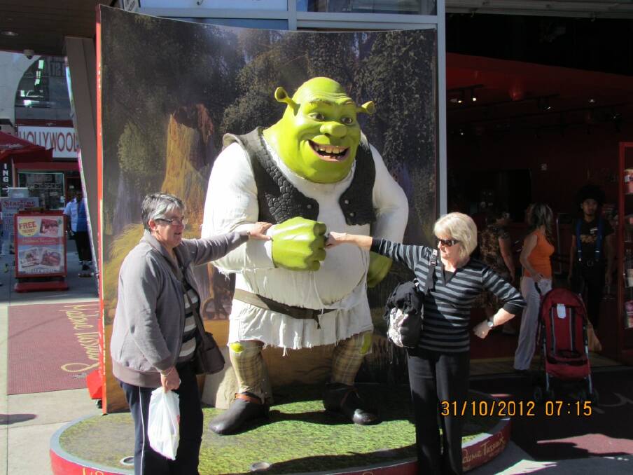 Cobrico's Glenise Johnston (left) and Warrnambool woman Carolyn Adams with Shrek in Hollywood, California earlier this month.