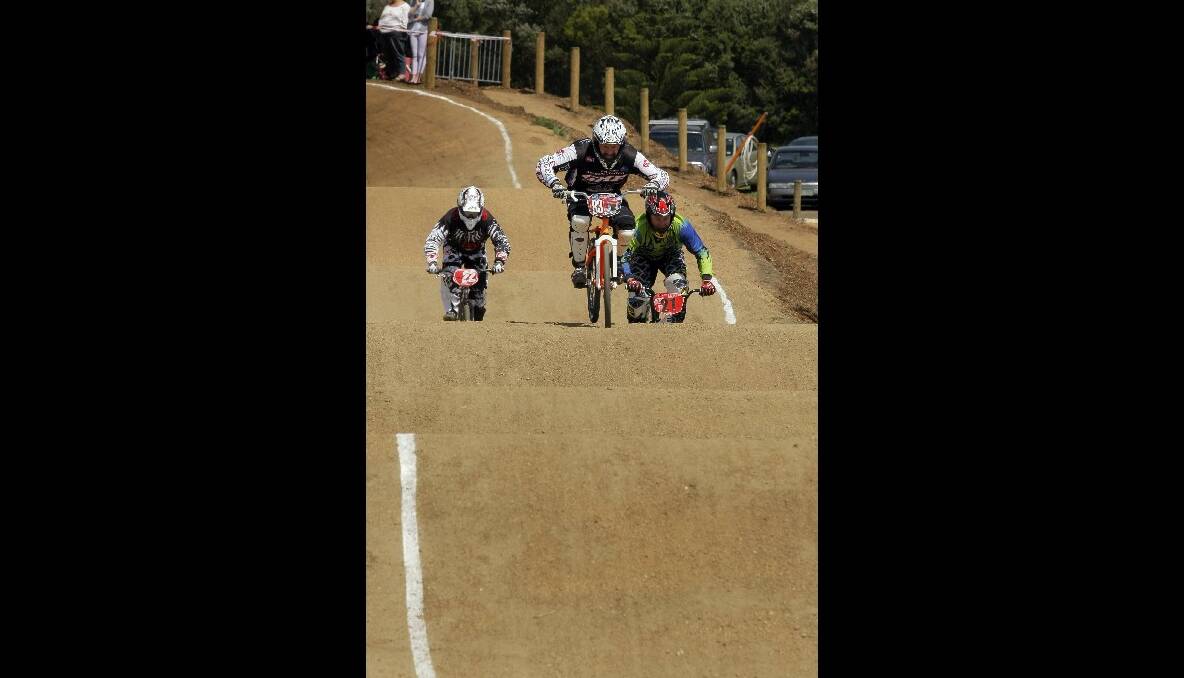 Riders race around the new BMX track built at Jetty Flat.