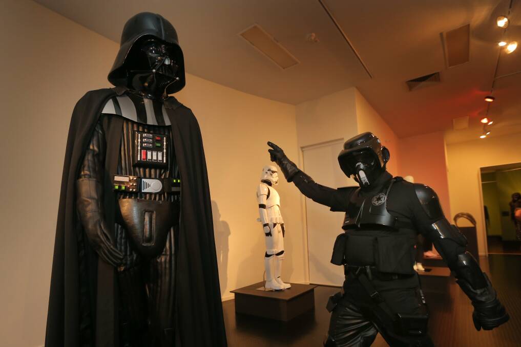 Shadow Scout Nick Wilson, of 501 Legion and Horsham, shows off his disco moves next to Darth Vader, at the Invasion opening.