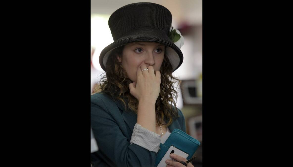 Krystal McNair, of Warrnambool, appears nervous as she watches the running of the Melbourne Cup at Lehy's Electricals. 