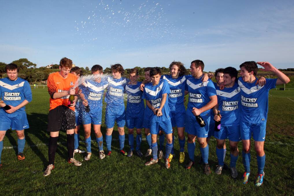 Rangers celebrate with champagne after finishing on top of the ladder. Picture: DAVE LANGLEY