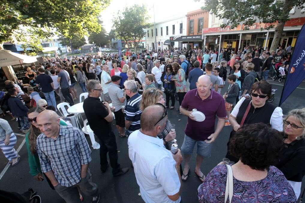A large crowd shows its support for the return of the Wunta street party in Liebig Street on Friday night.