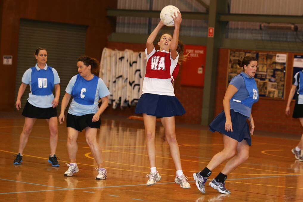 Opals wing attack Lucy Blair gathers the ball in hostile territory vs the Half Blacks. Picture: ROB GUNSTONE