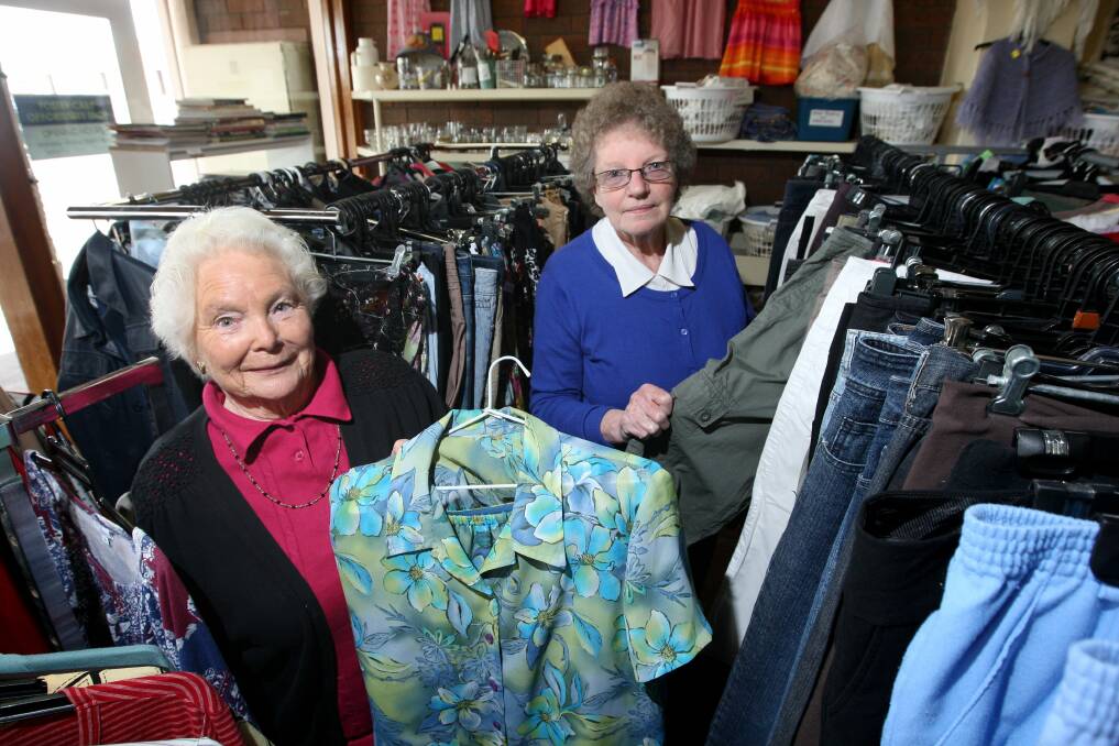 The Brophy Opp Shop in Koroit Street Warrnambool has raised $1.2 million for Brophy in the past 12 months. Pictured are volunteers Lorna Lyon, and Muriel McKenzie. Picture: AARON SAWALL
