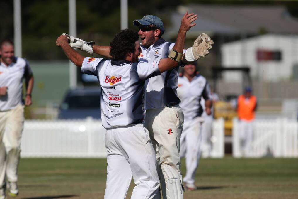 Justin Coote, and Heinrich Joyce from Grampians at the end of the Twenty 20 grand final versus Irrewarra at Allansford Recreation Reserve. Picture: AARON SAWALL