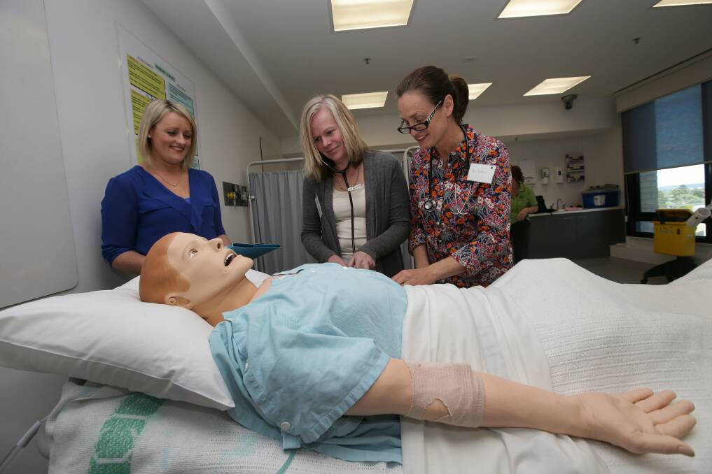 Dr Alice Kelly with Div 1 nurses from Terang, Sarah Williams and Jen Burrows, taking part in a simulation program initially developed for Deakin University's medical students. The program at South West Healthcare now helps other health professionals in the region. Picture DAMIAN WHITE